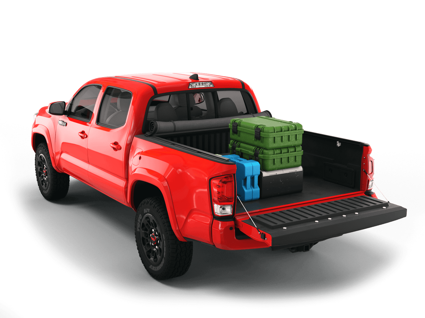 Red Toyota Tacoma with gear in the truck bed and the Sawtooth Stretch tonneau cover rolled up at cab 